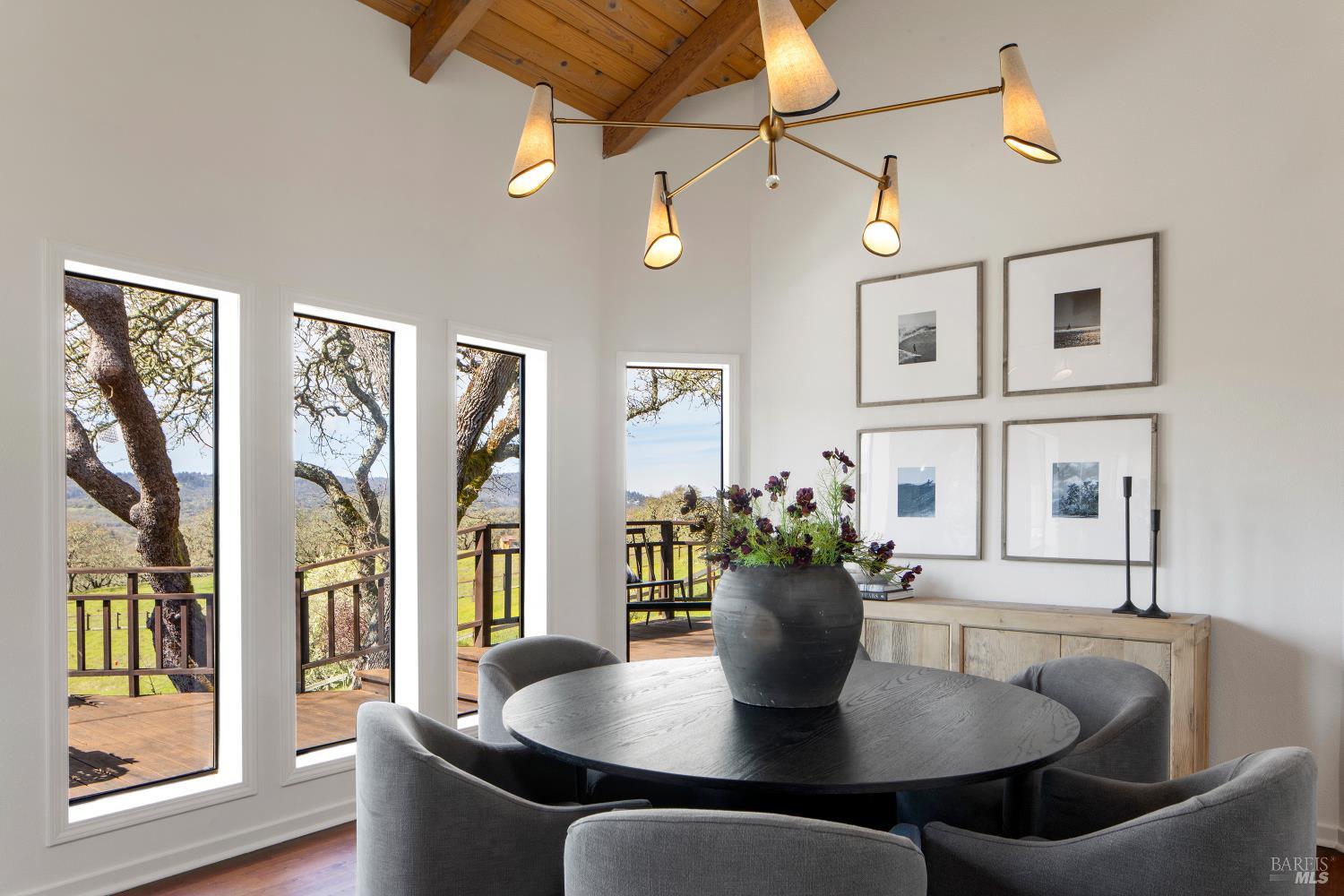 3460 Warm Springs Road Glen Ellen, CA 95442 - Photo 13 of 40 a dining room with furniture and wooden floor