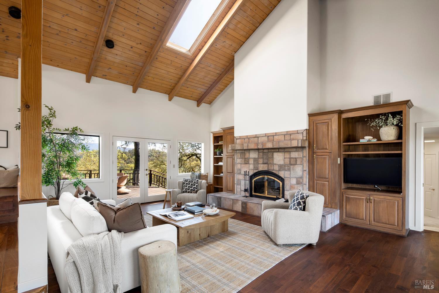 3460 Warm Springs Road Glen Ellen, CA 95442 - Photo 5 of 40 a living room with furniture and a fireplace