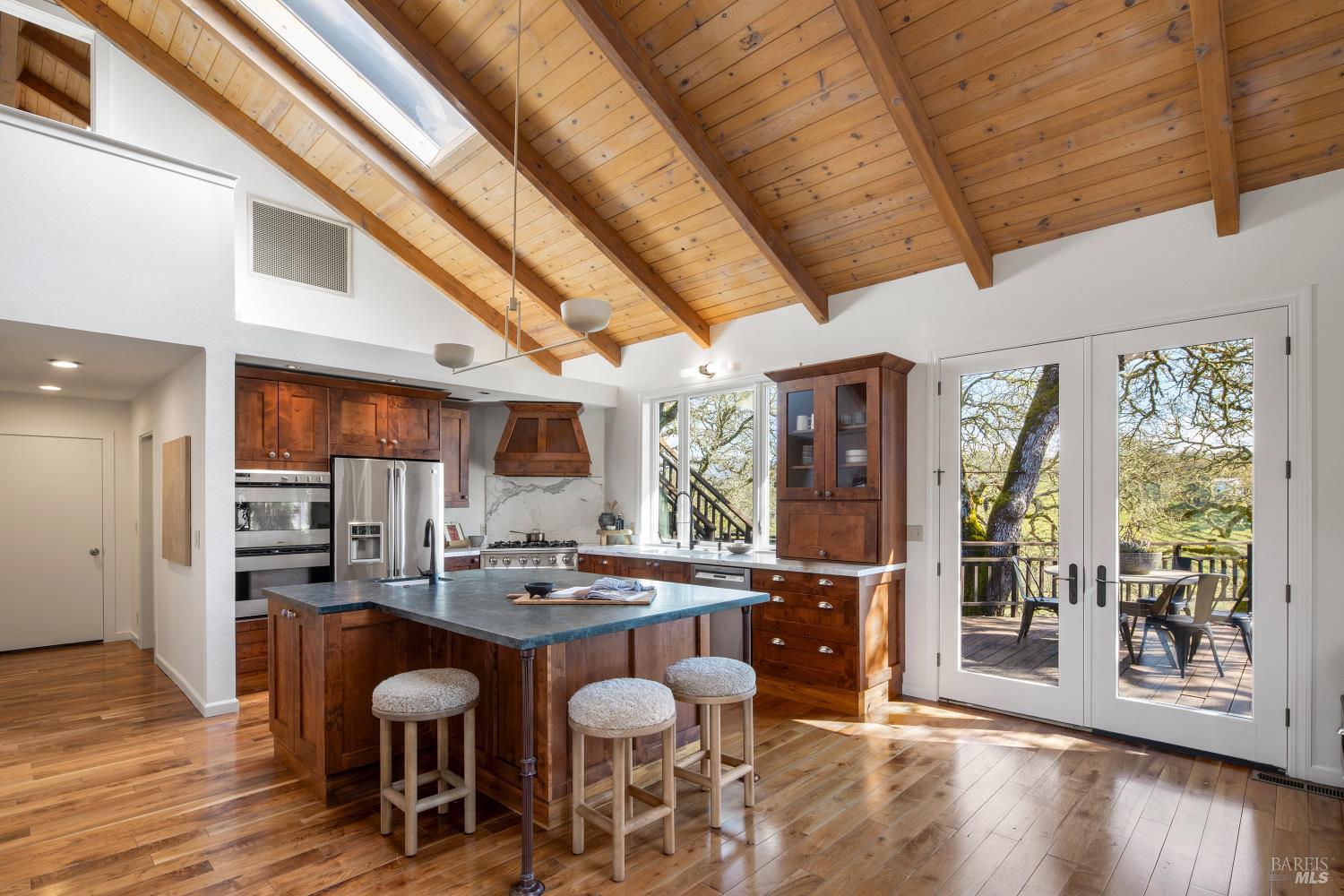 3460 Warm Springs Road Glen Ellen, CA 95442 - Photo 8 of 40 a open dining room with wooden floor and furniture