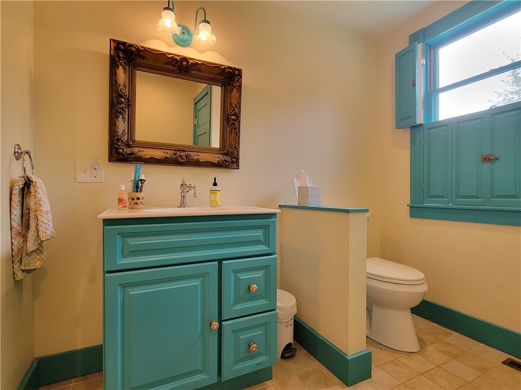 23 Morgan Street Newport, RI 02840 - Photo 20 of 30 1st floor bathroom with stacked laundry