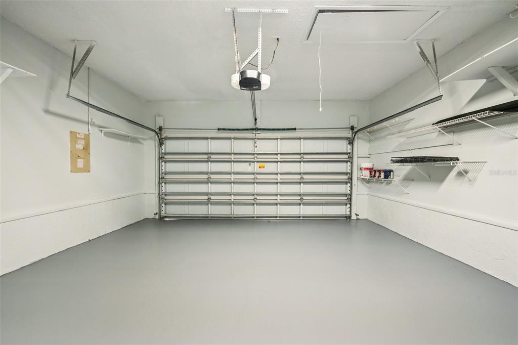 3109 Lake Valencia Lane East Palm Harbor, FL 34684 - Photo 31 of 59 a storage room with racks on the wall