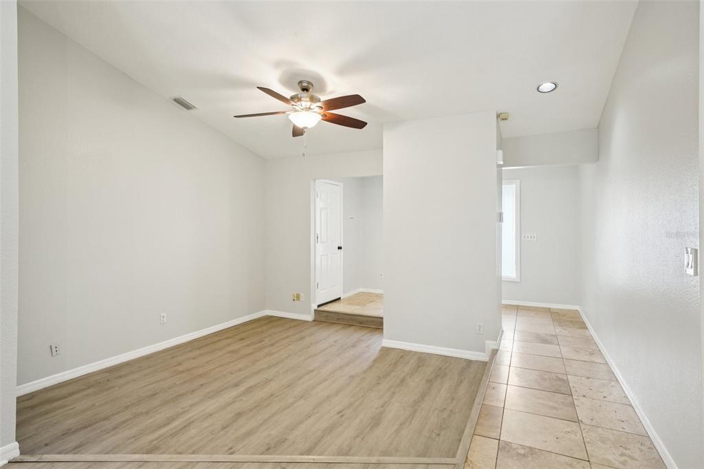 3109 Lake Valencia Lane East Palm Harbor, FL 34684 - Photo 7 of 59 a view of empty room with wooden floor