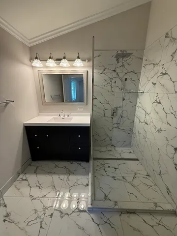 a bathroom with a sink and a shower