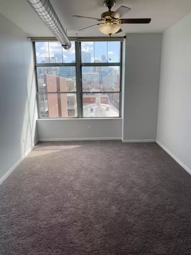 1200 West Monroe Street, Unit 603 Chicago, IL 60607 - Photo 5 of 11 an empty room with a window