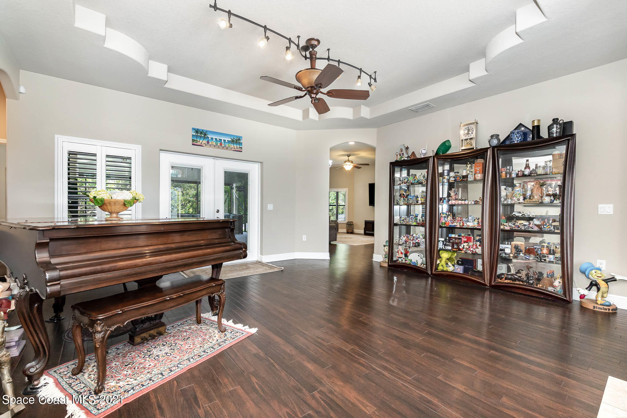 4175 Waterloo Place Melbourne, FL 32940 - Photo 13 of 49 a view of a livingroom with furniture and wooden floor