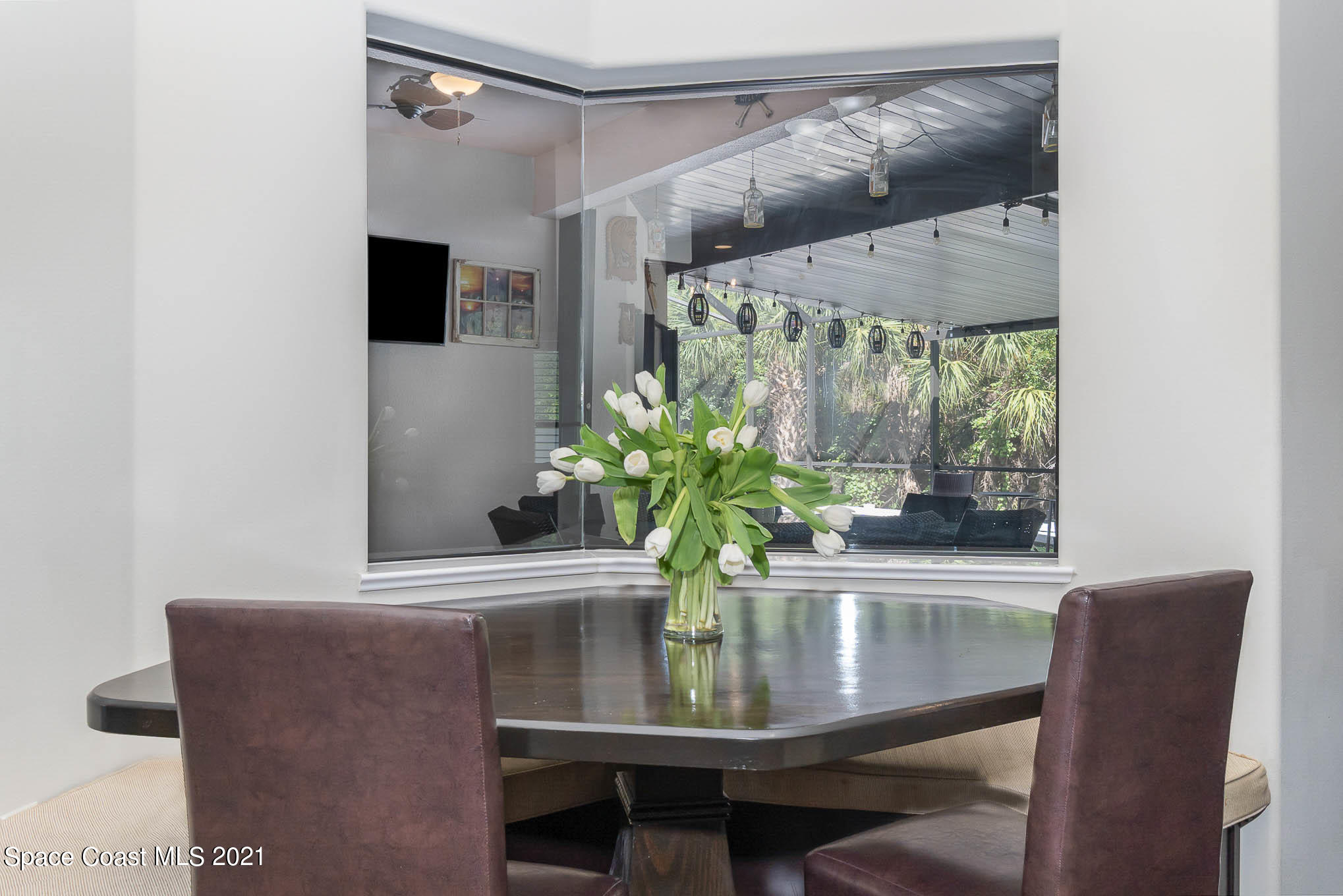 4175 Waterloo Place Melbourne, FL 32940 - Photo 22 of 49 a dining room with furniture and window