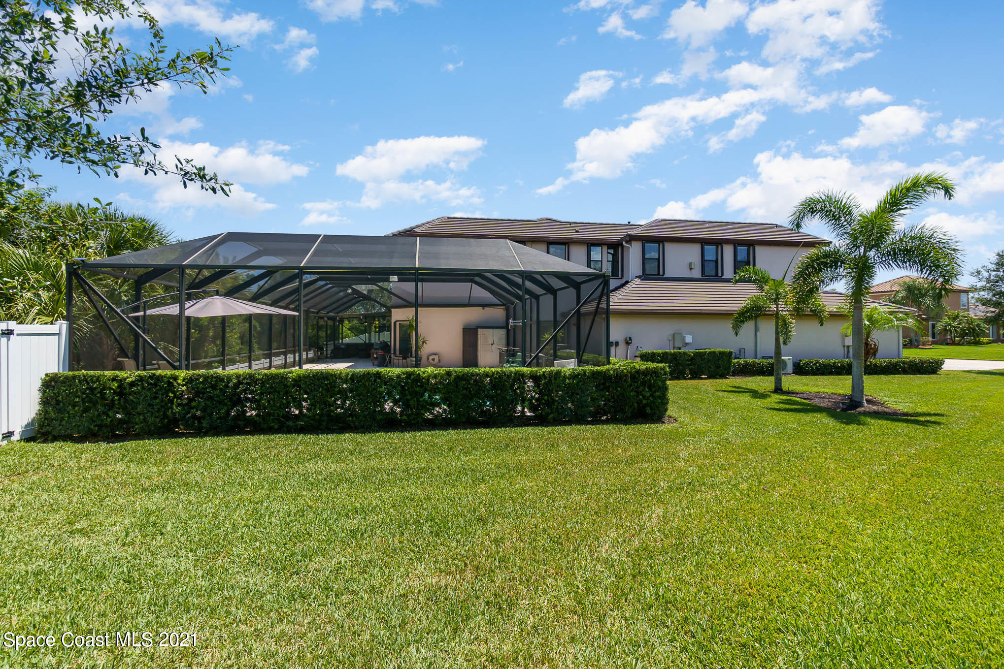 4175 Waterloo Place Melbourne, FL 32940 - Photo 7 of 49 a front view of a house with garden