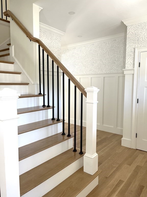 18 Libby Avenue Reading, MA 01867 - Photo 19 of 23 a view of staircase with white walls