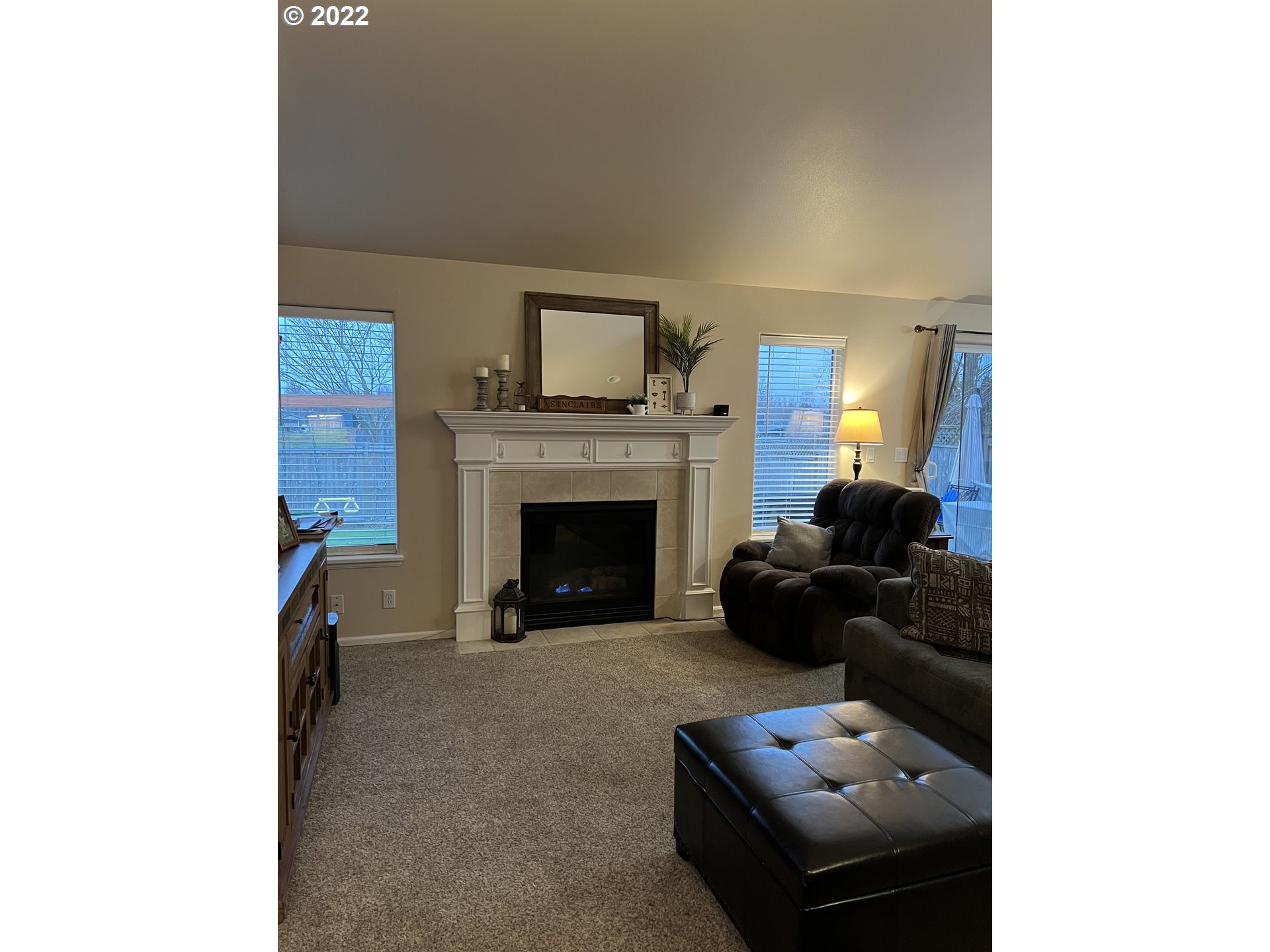 6073 Pine Ridge Place Eugene, OR 97402 - Photo 3 of 18 a living room with furniture and a fireplace