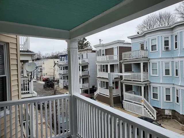 a view of a building from a balcony