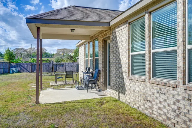 a view of swimming pool with patio