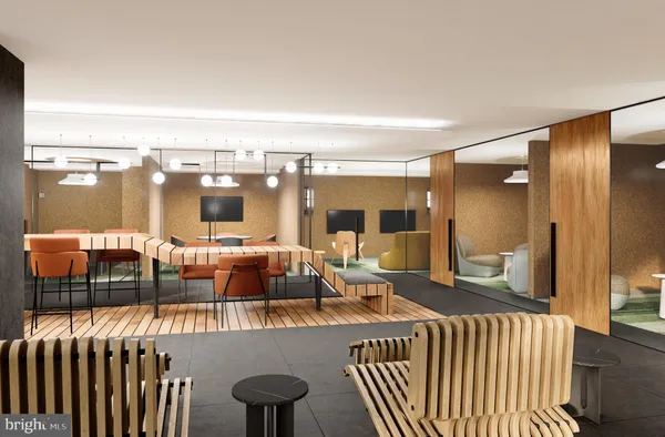 a living room with lots of furniture and a table