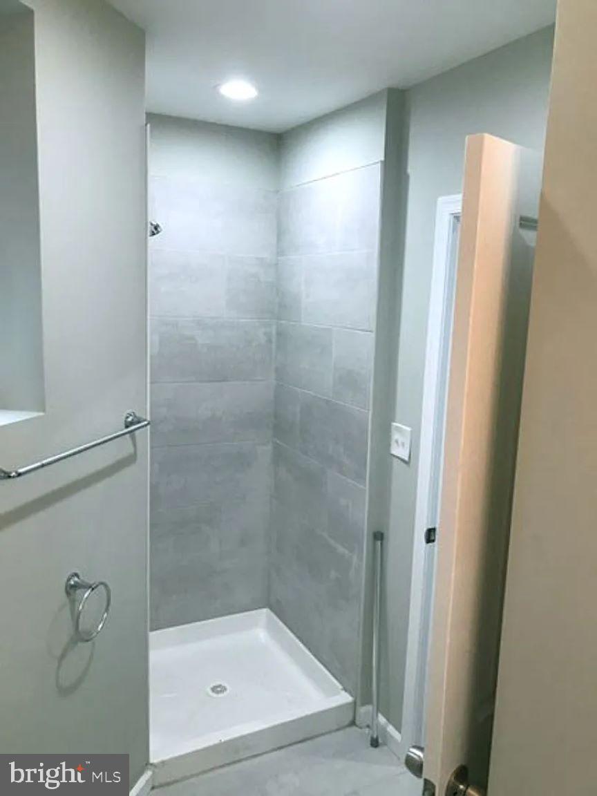 228 South Edgewood Street Philadelphia, PA 19139 - Photo 14 of 15 a bathroom with a shower