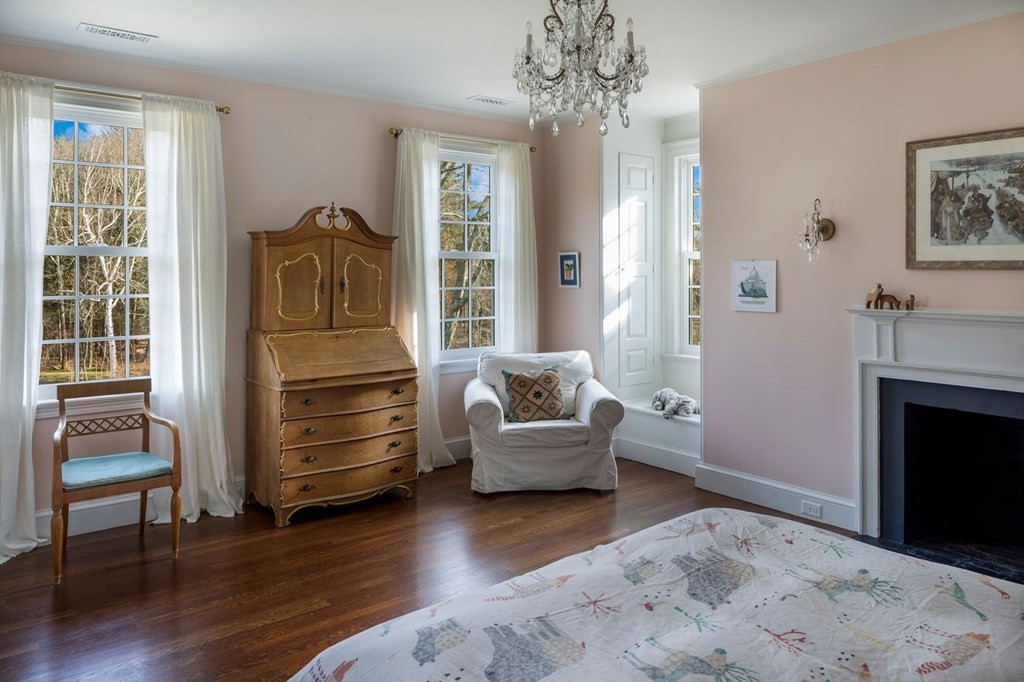 401 Sandy Valley Road Westwood, MA 02090 - Photo 13 of 26 a bedroom with furniture and a fireplace