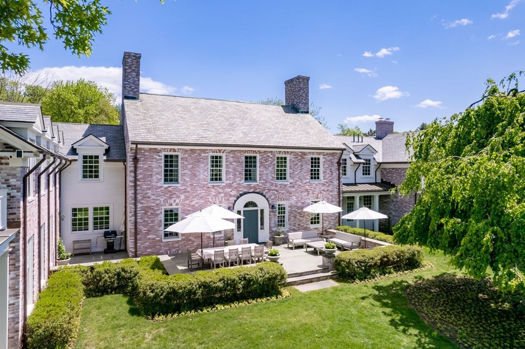 401 Sandy Valley Road Westwood, MA 02090 - Photo 18 of 26 a front view of a house with garden