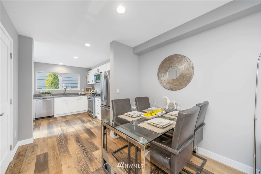 423 Martin Luther King Jr Way South, Unit A Seattle, WA 98144 - Photo 12 of 31 a workspace with furniture and a view of kitchen