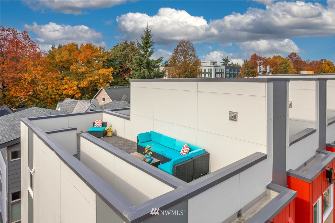 423 Martin Luther King Jr Way South, Unit A Seattle, WA 98144 - Photo 7 of 31 a view of roof deck with furniture