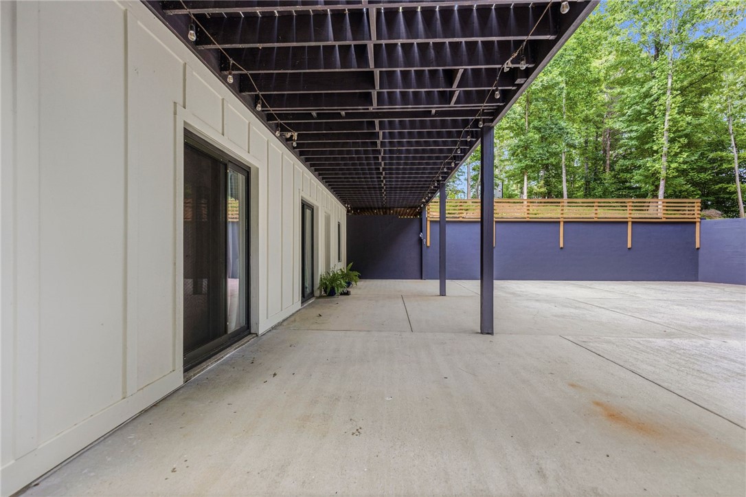 641 Lands End Road Seneca, SC 29678 - Photo 30 of 39 A spacious covered patio provides a versatile outdoor living area.