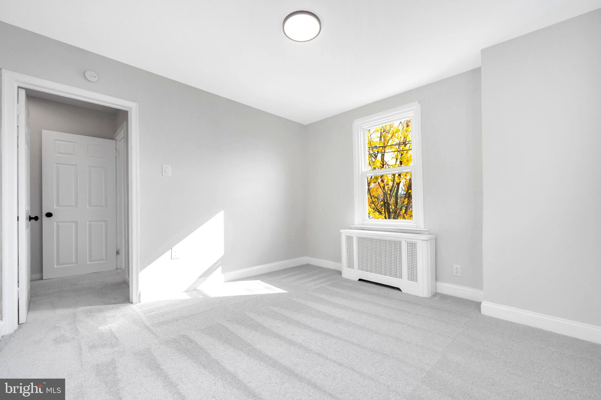 4938 State Road Drexel Hill, PA 19026 - Photo 16 of 38 an empty room with windows and closet