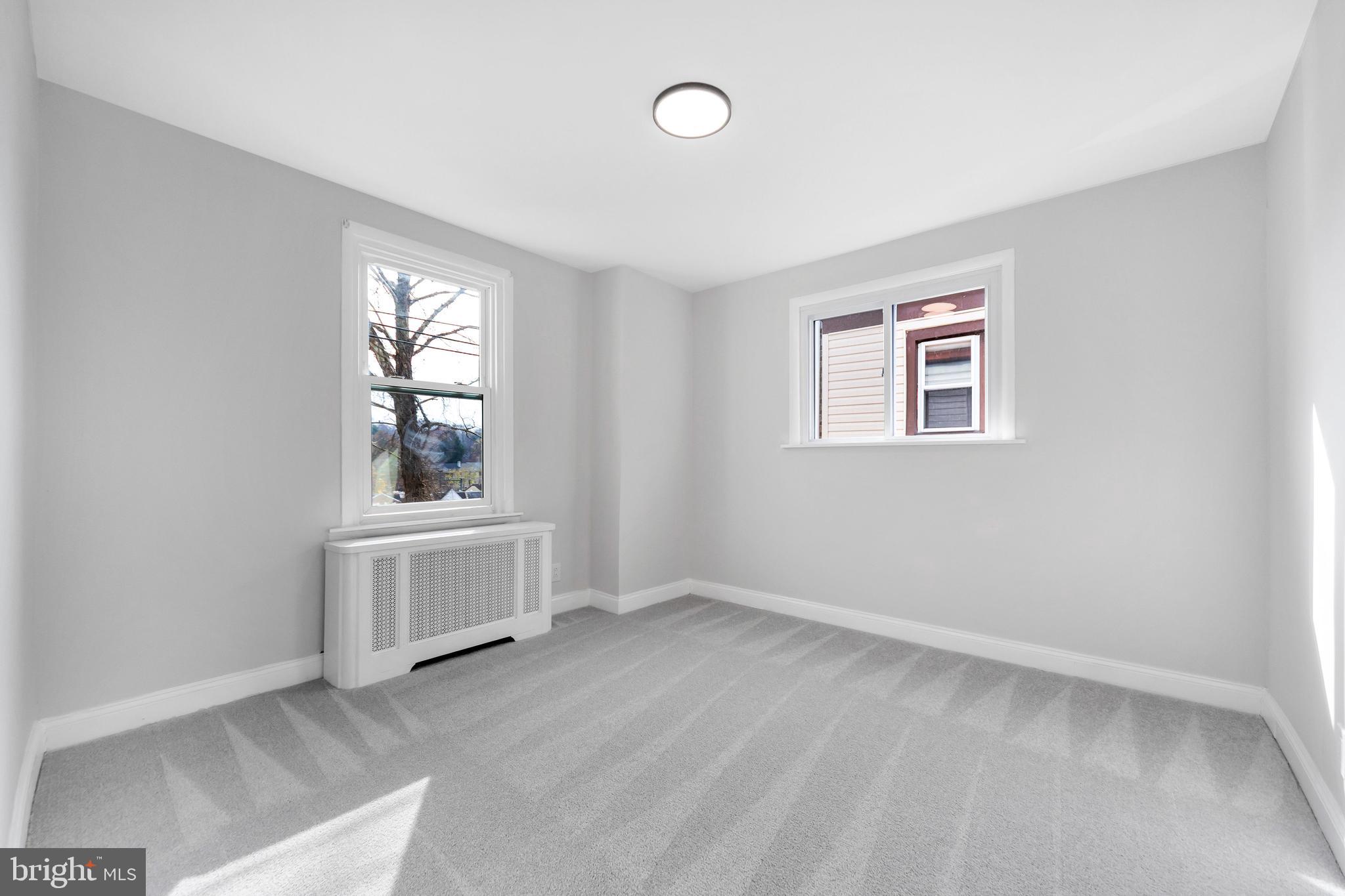 4938 State Road Drexel Hill, PA 19026 - Photo 17 of 38 an empty room with windows