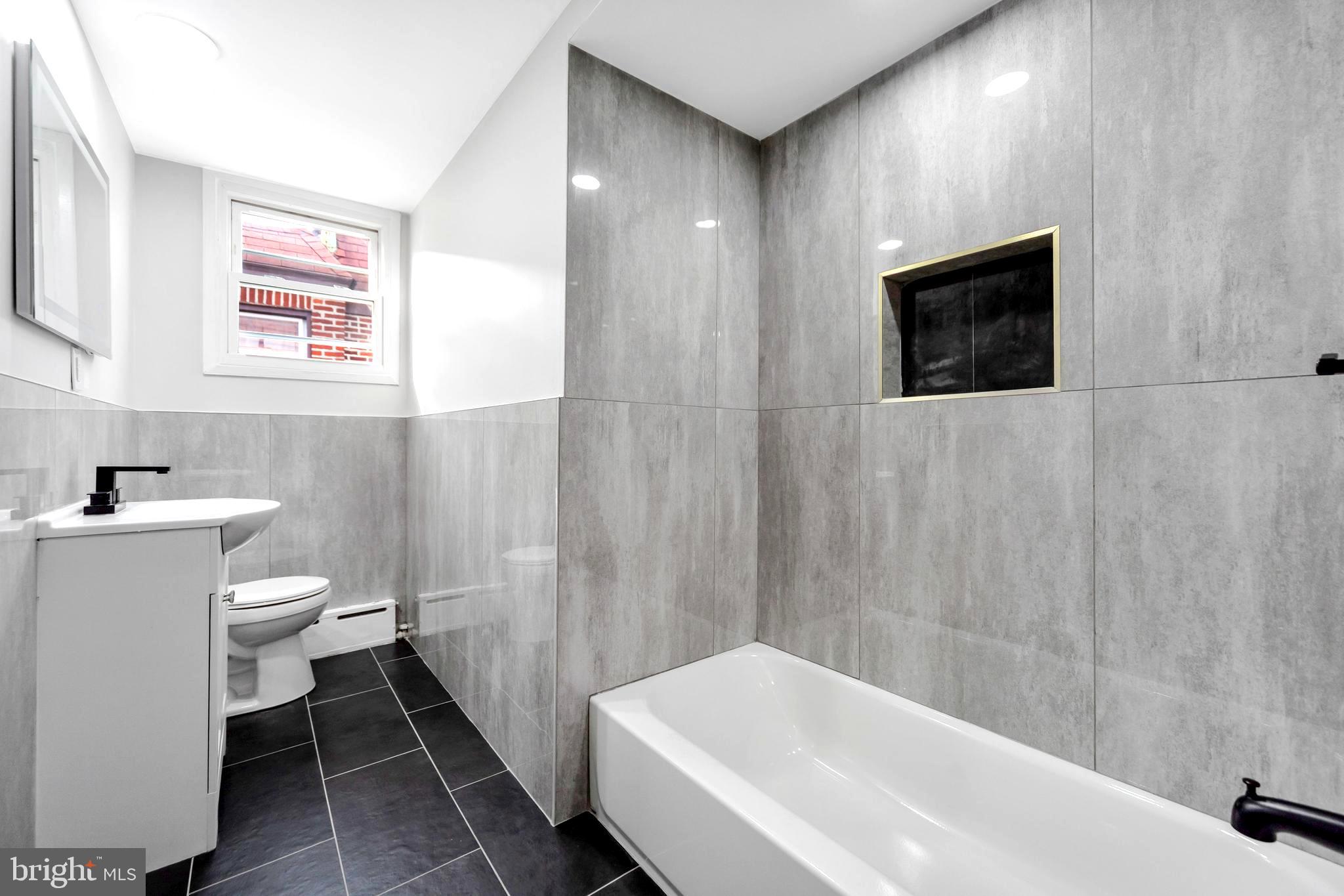 4938 State Road Drexel Hill, PA 19026 - Photo 20 of 38 a bathroom with a sink and a toilet