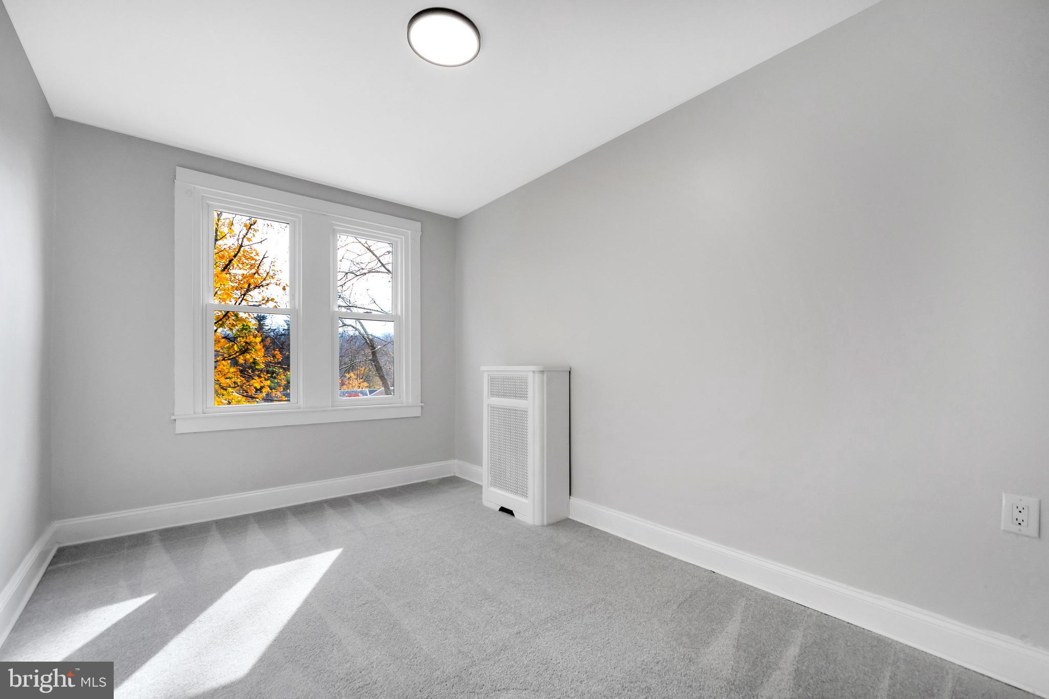 4938 State Road Drexel Hill, PA 19026 - Photo 22 of 38 an empty room with windows