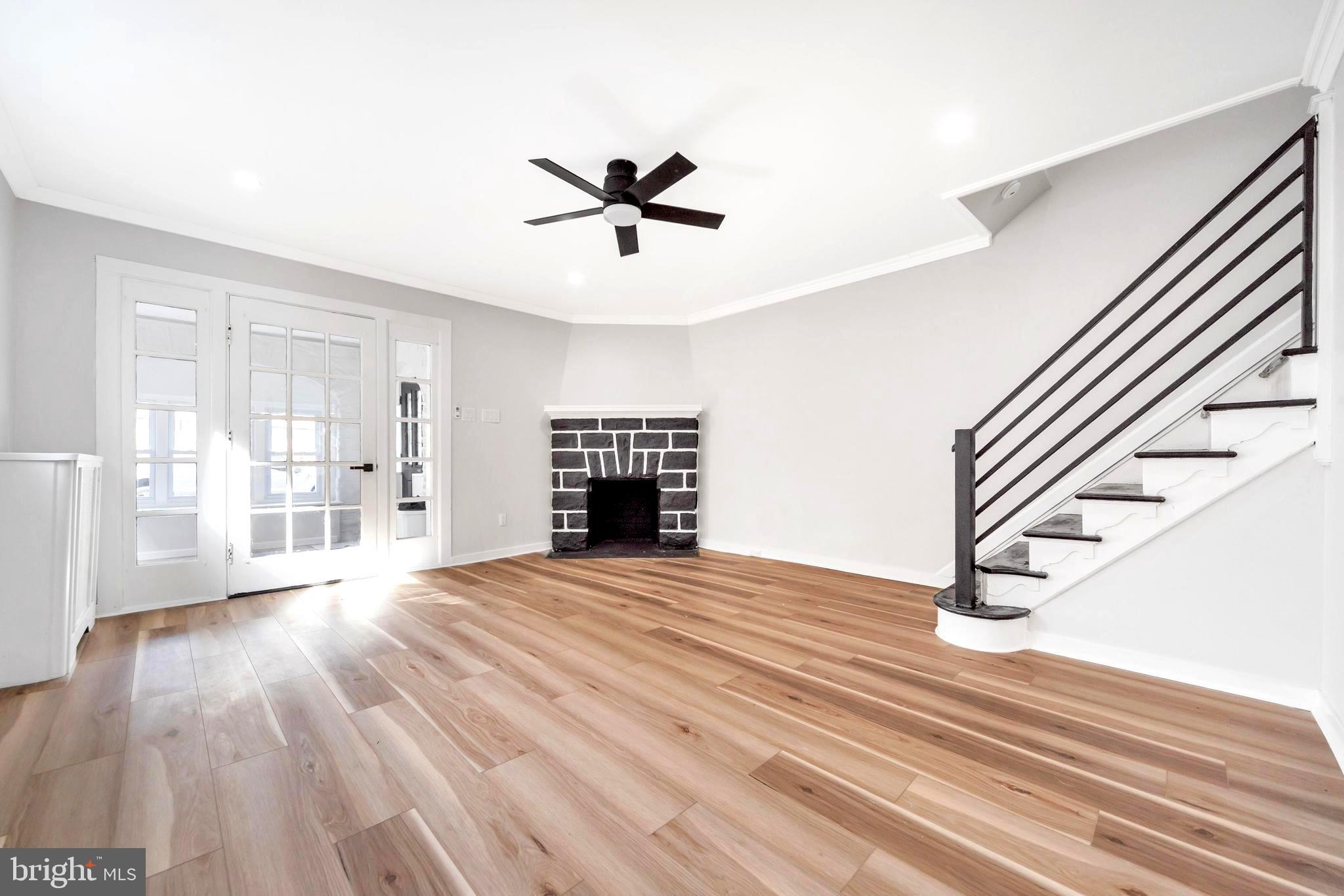 4938 State Road Drexel Hill, PA 19026 - Photo 5 of 38 a view of an empty room with wooden floor and a window