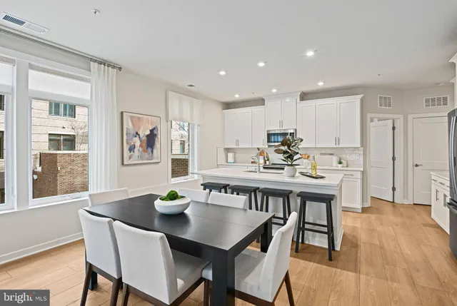 a view of a building and a people on a street