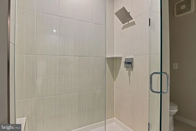 a view of park with large trees