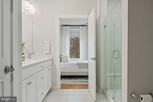 a view of a yard with wooden fence