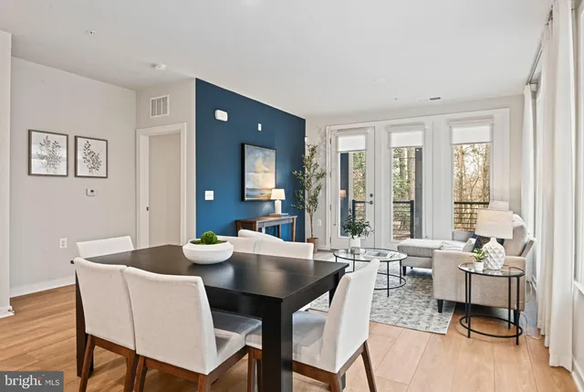 a view of outdoor space with seating area and livingroom with furniture