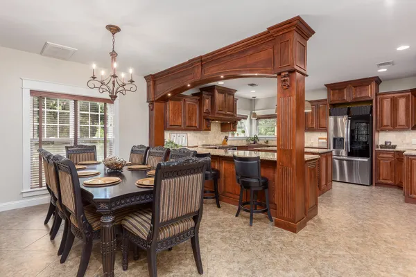 a view of a dining room with furniture