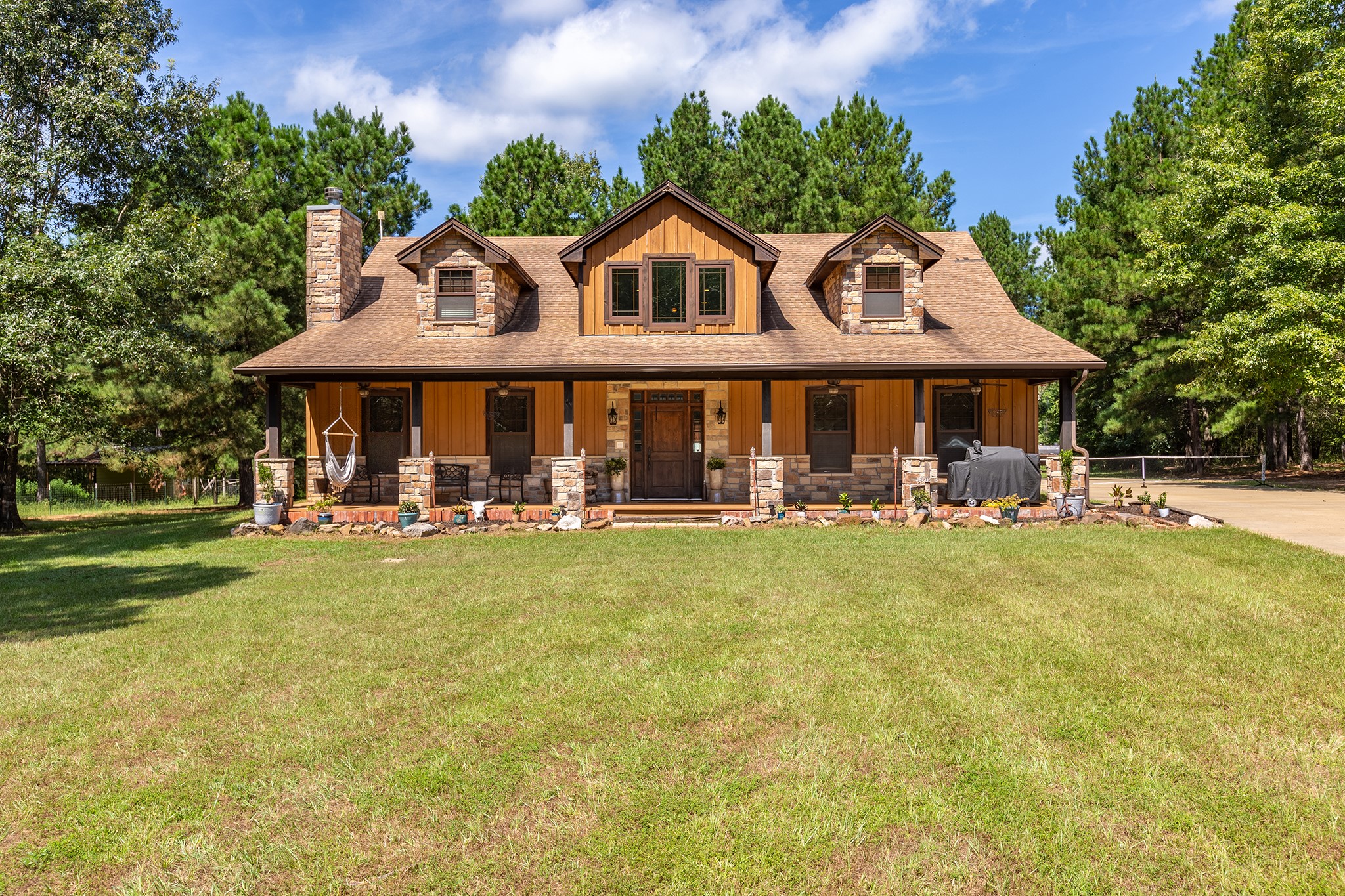 5848 Fm 1751 Bronson, TX 75930 - Photo 2 of 50 a front view of a house with swimming pool having outdoor seating