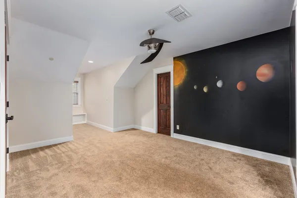 a view of a room with a hallway