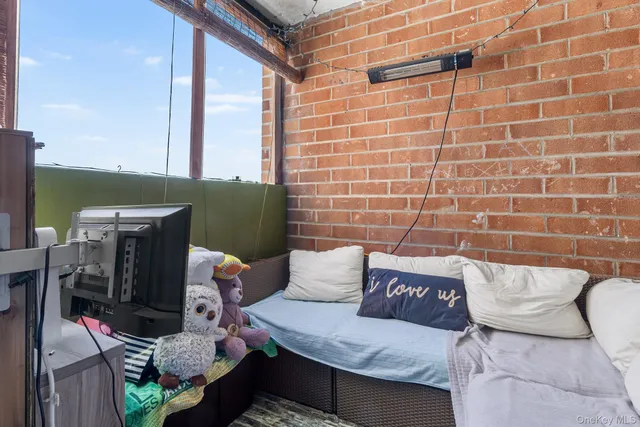 a view of a chairs and table in the patio