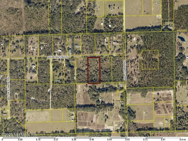 a view of a lake with a yard