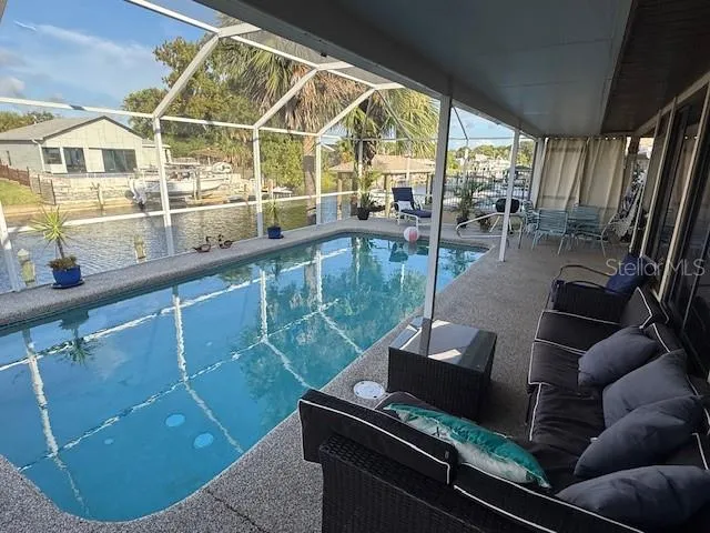 a view of a living room with furniture