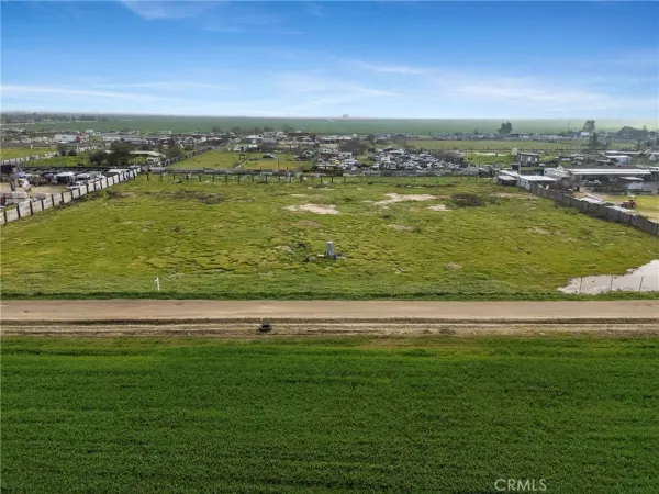 a view of a city with a big pool