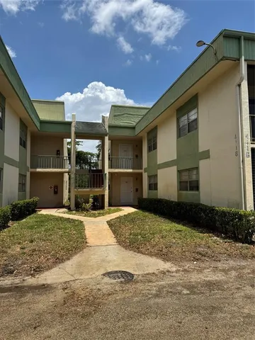 a view of a house with a patio