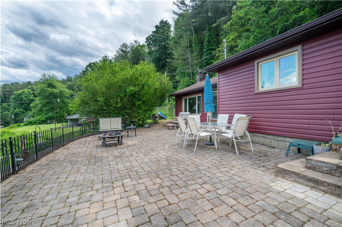 86630 Beaver Dam Road Scio, OH 43988 - Photo 9 of 26 View of terrace featuring a fire pit
