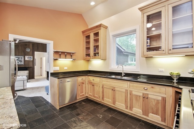 1190 Ridge Road Highland Park, IL 60035 - Photo 5 of 13 a kitchen with granite countertop a sink and cabinets
