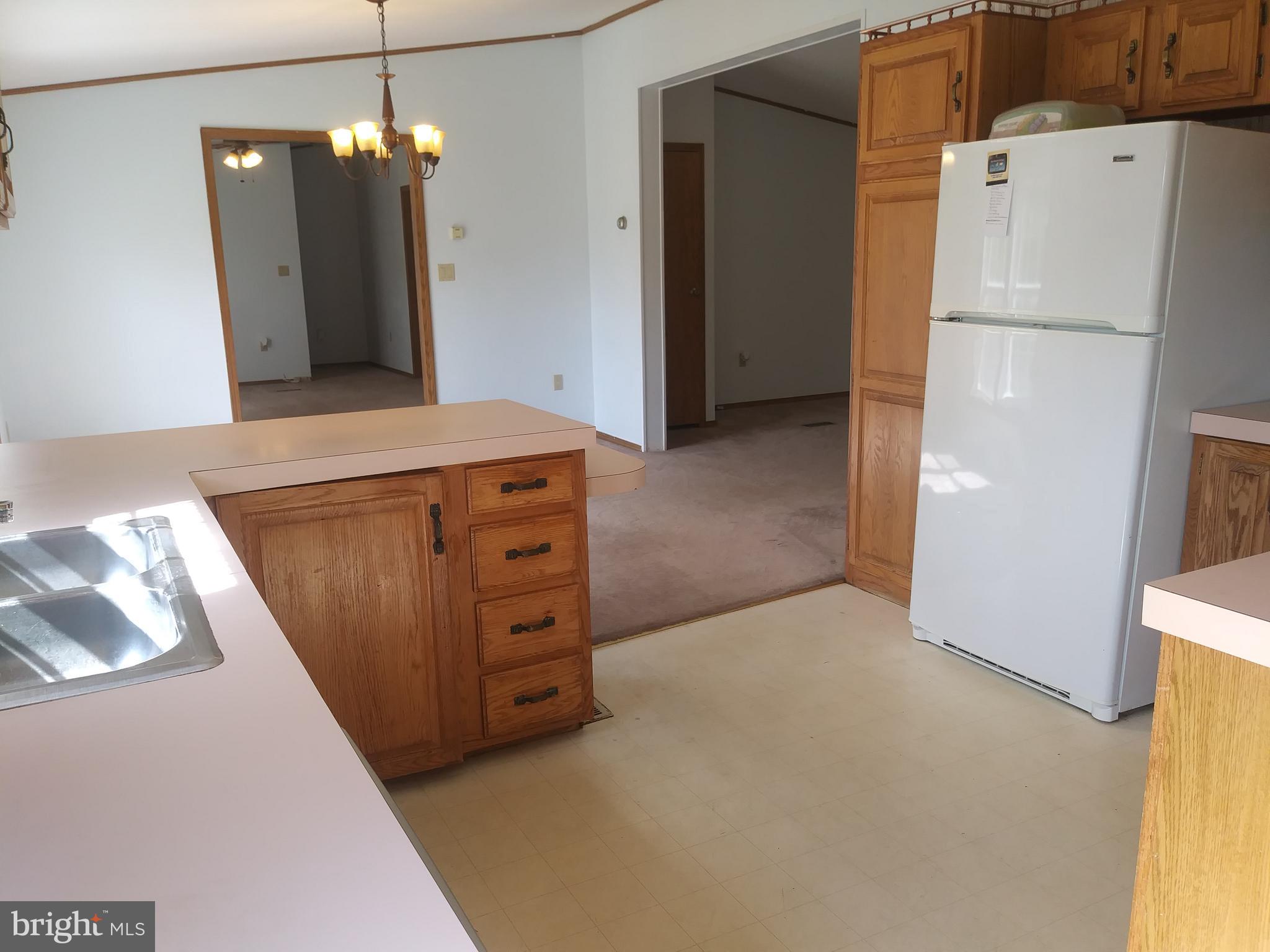 425 Ferrell Road Mullica Hill, NJ 08062 - Photo 2 of 13 Enter the back door into the kitchen.