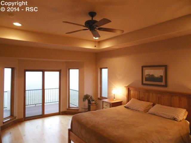 37285 Harrisville Road Calhan, CO 80808 - Photo 13 of 24 Main Level Master Suite ~ Walk Out To Deck ~ Coffered Ceiling