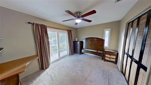 workspace with wooden floor fan and windows