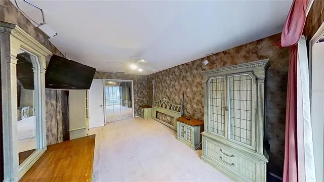 a bathroom with a bathtub and shower