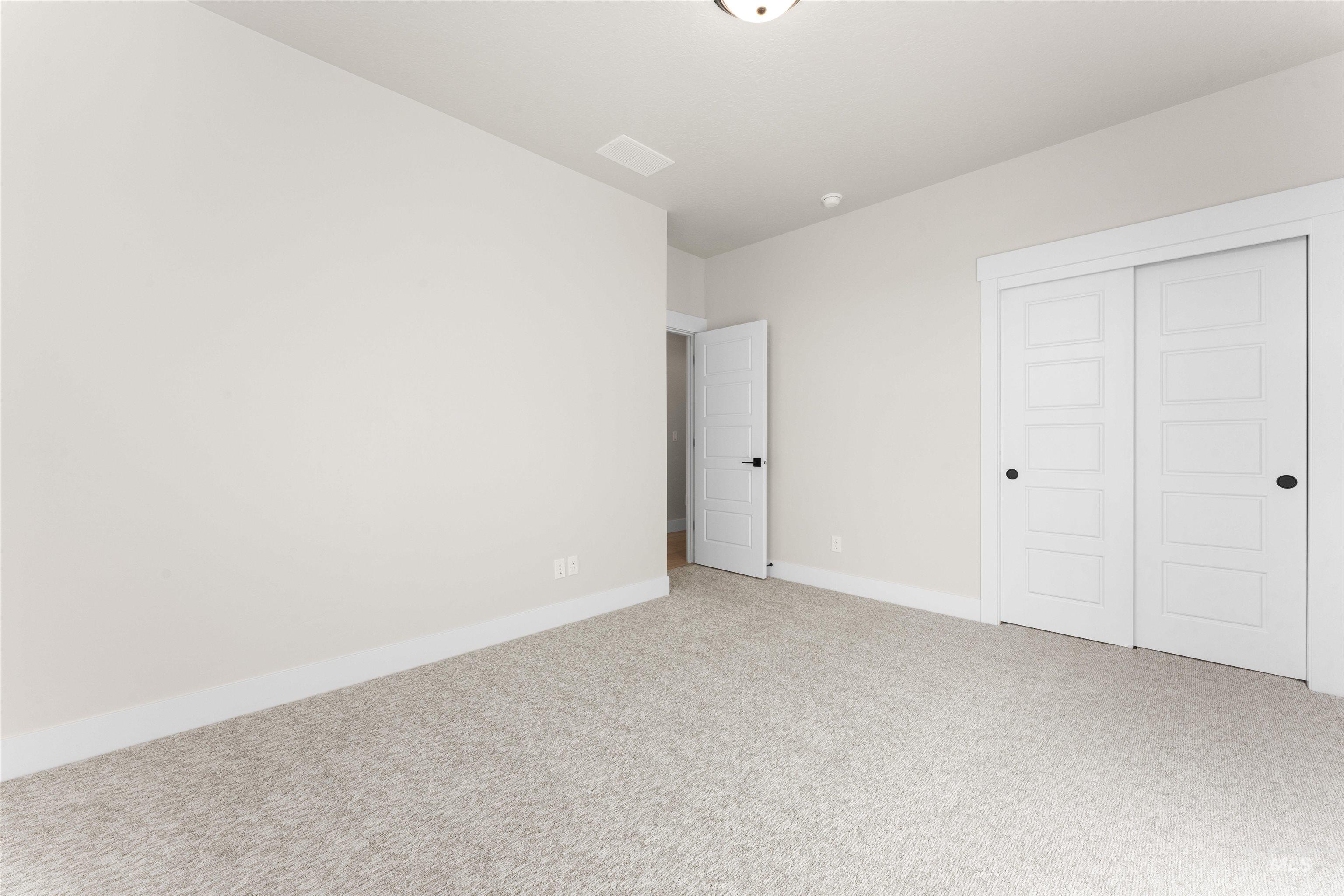 8076 Tandy Cv Street Middleton, ID 83644 - Photo 27 of 41 Unfurnished bedroom featuring a closet and light carpet