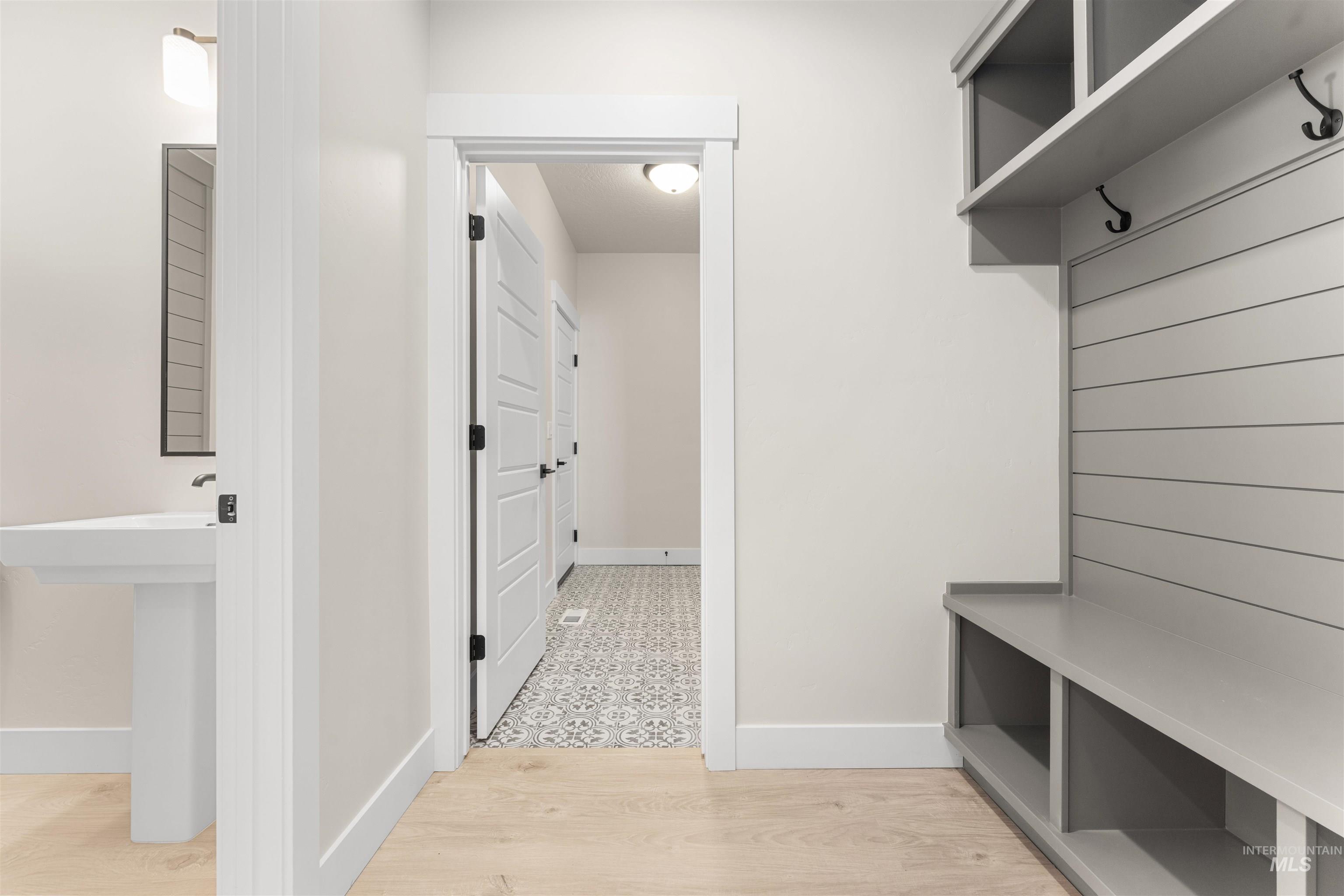 8076 Tandy Cv Street Middleton, ID 83644 - Photo 34 of 41 Mudroom featuring baseboards and light wood-style flooring