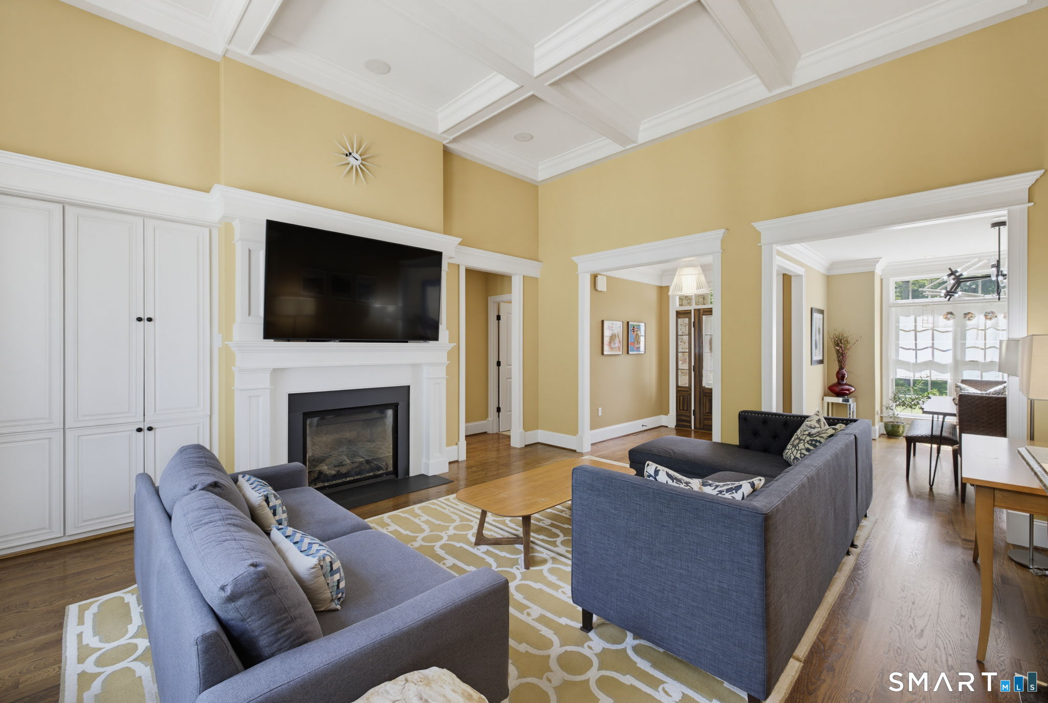 158 Appian Way Coventry, CT 06238 - Photo 11 of 40 a living room with furniture flat screen tv and a fireplace