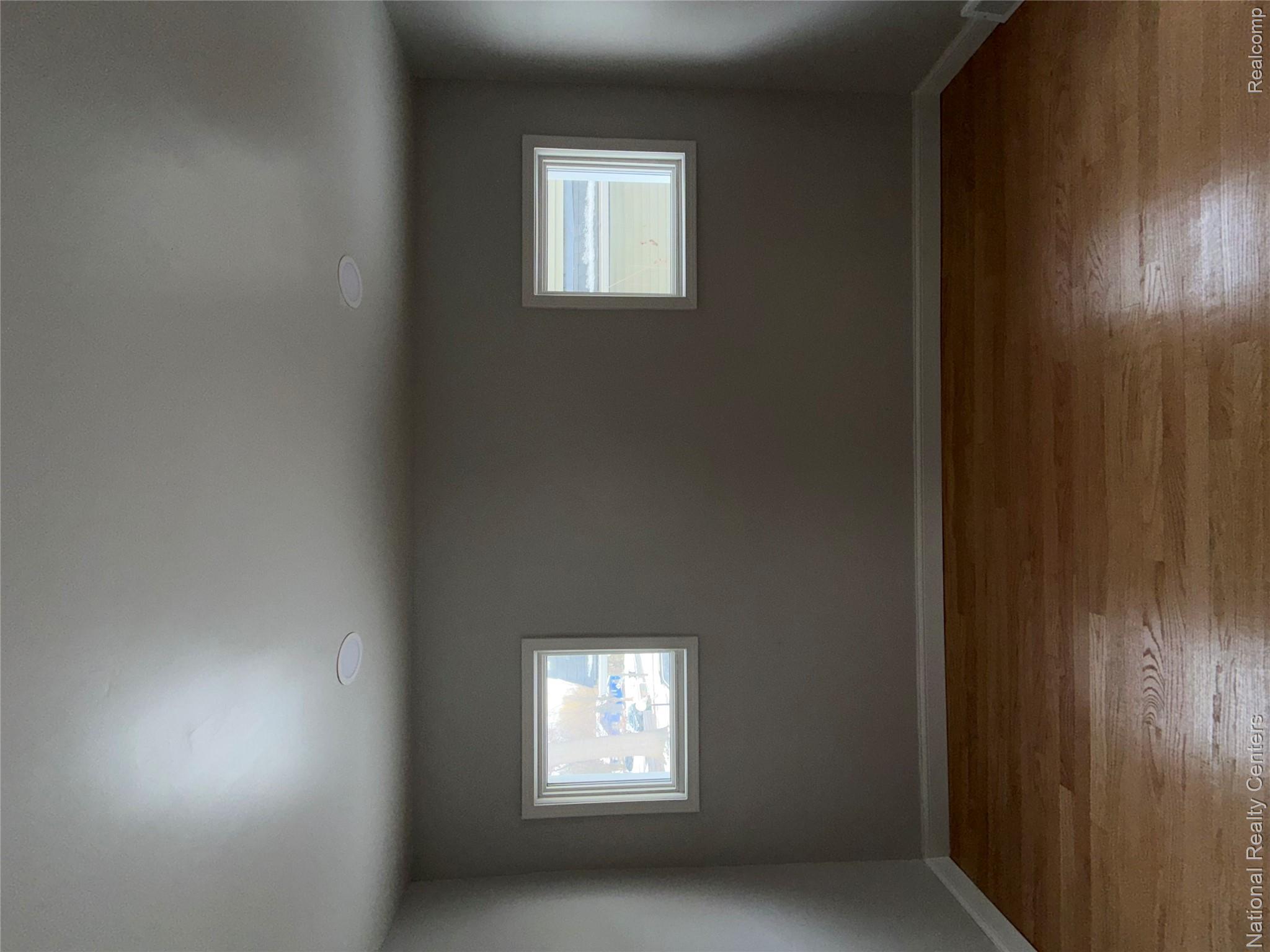 16522 Inverness Street Detroit, MI 48221 - Photo 5 of 62 Unfurnished room featuring light wood-style floors