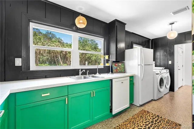 a view of an entryway door front of a house